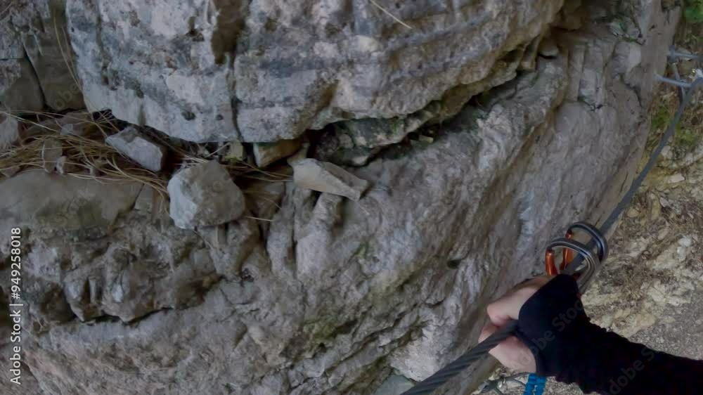 POV Via Ferrata, Vertical Climb With Safety Climbing Set Closeup Of Rocks POV Via Ferrata, Vertical Climb With Safety Climbing Set Closeup Of Rocks
