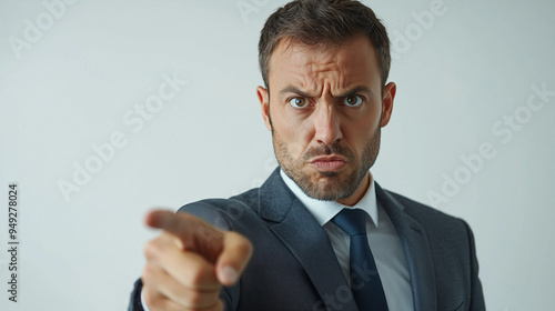 A male office worker with a...