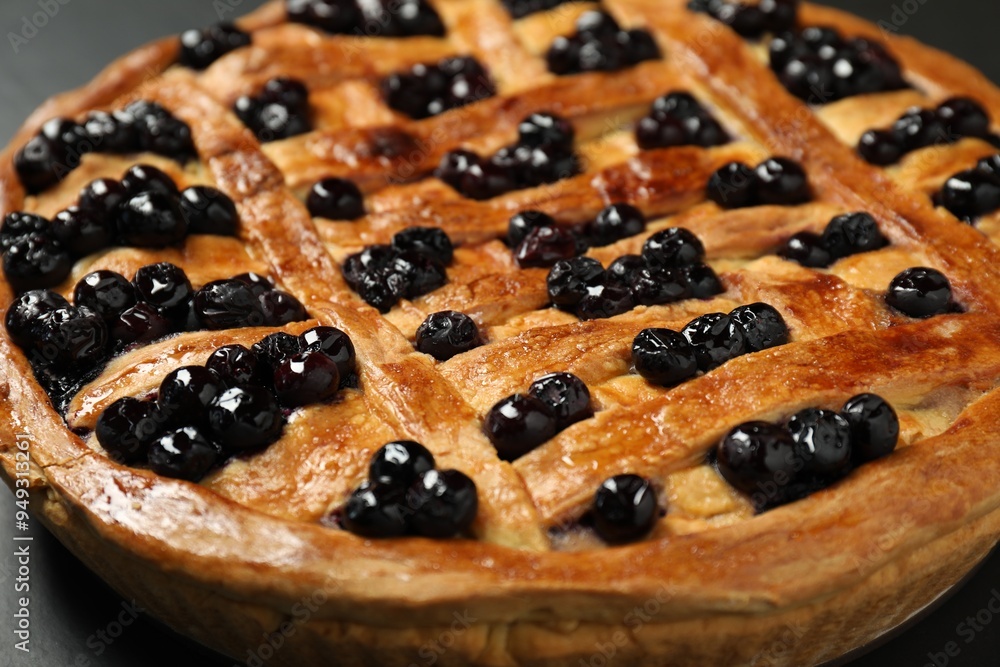 Tasty homemade pie with blueberries on table, closeup Tasty homemade pie with blueberries on table, closeup