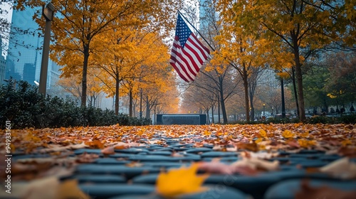 American flag and Ground Zero Memorial surrounded by autumn foliage
