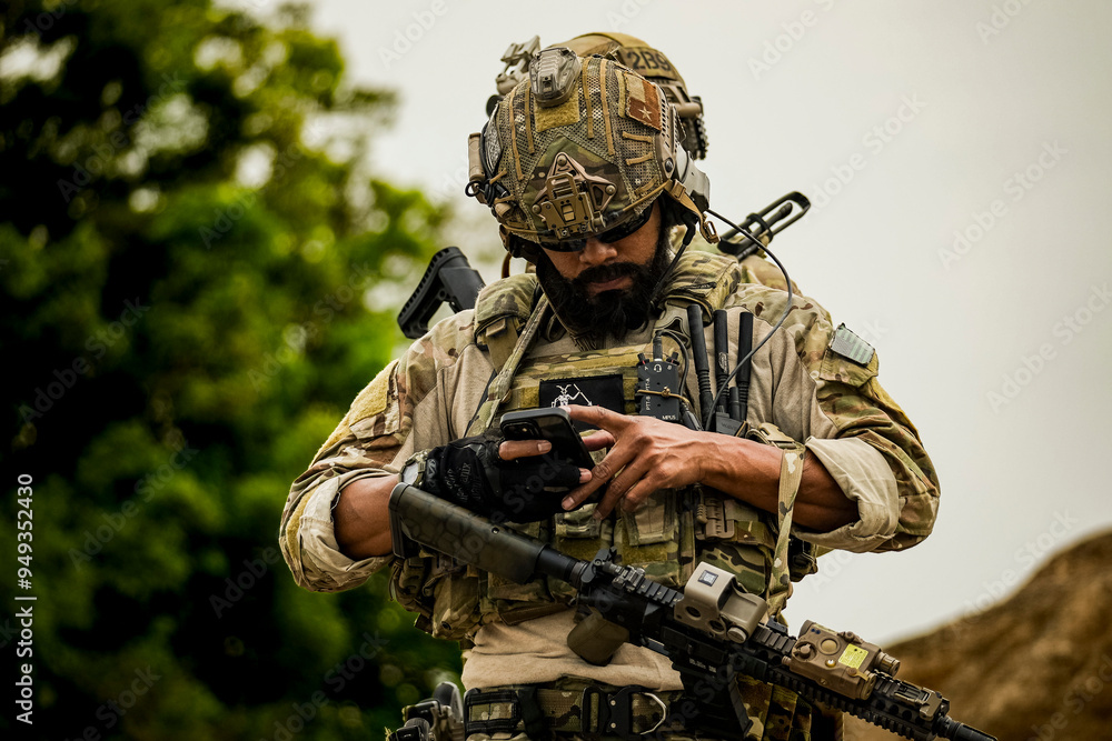 A group of military men in combat gear patrol in the middle of a desert and tropical jungle. Soldiers in full combat gear in dry weather conditions assemble and march on a mission. A group of military men in combat gear patrol in the middle of a desert and tropical jungle. Soldiers in full combat gear in dry weather conditions assemble and march on a mission.
