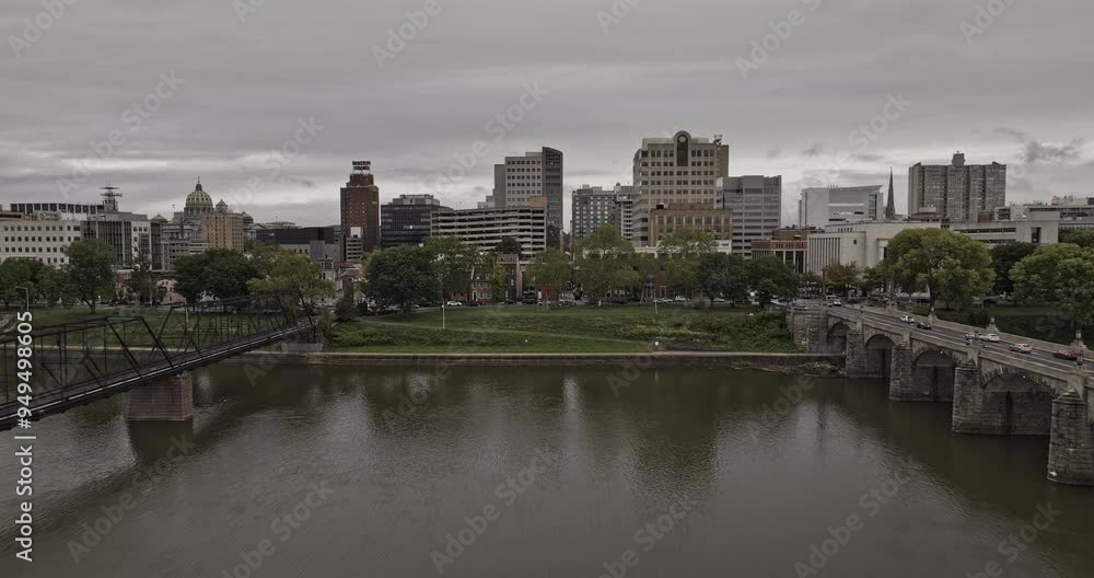 Harrisburg Pennsylvania Aerial v1 low flyover river in-between bridges capturing downtown cityscape with a mix of commercial and residential buildings - Shot with Mavic 3 Pro Cine - Sept 24th 2023 Harrisburg Pennsylvania Aerial v1 low flyover river in-between bridges capturing downtown cityscape with a mix of commercial and residential buildings - Shot with Mavic 3 Pro Cine - Sept 24th 2023