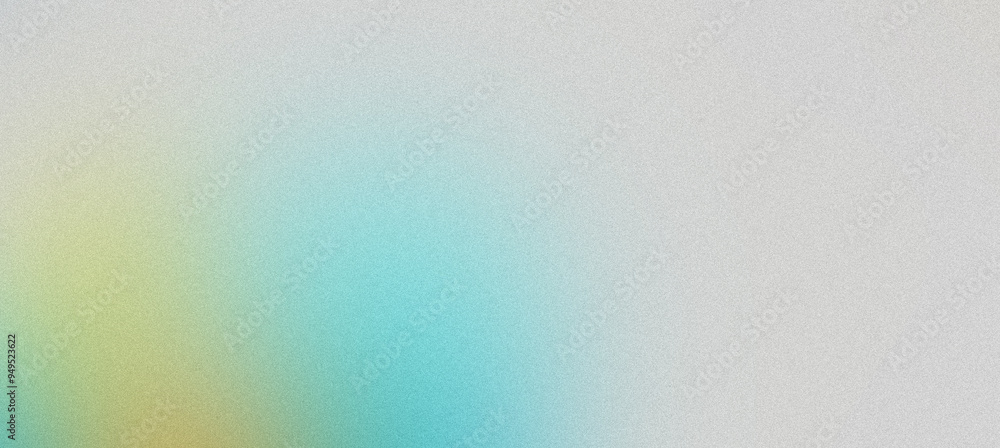 Obraz premium Grainy textured abstract background with a soft pastel gradient from blue to yellow
