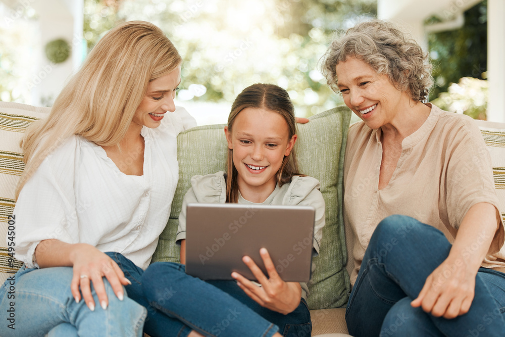 Daughter, grandparent and mother on sofa with tablet for gaming, video or visit in home together. Education, smile and streaming with happy family in apartment for development, learning or study Daughter, grandparent and mother on sofa with tablet for gaming, video or visit in home together. Education, smile and streaming with happy family in apartment for development, learning or study