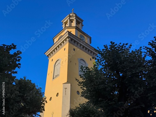 Exterior view of the Church of St. Mary Magdalene and its bell tower photo