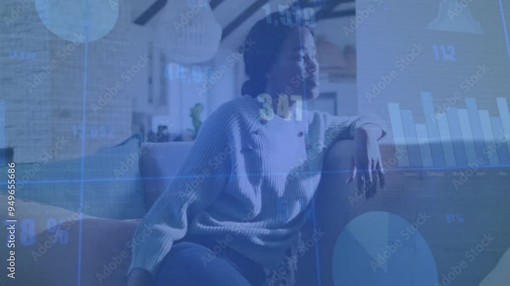 Financial data processing animation over woman sitting on couch in living room Financial data processing animation over woman sitting on couch in living room