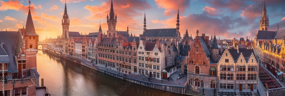 Fototapeta premium Belgium: Beautiful Medieval Ghent Town at Sunset - Travel Landmarks in Historic Cityscape