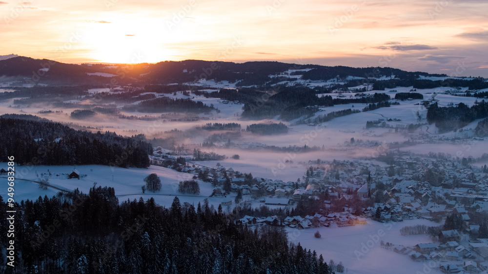 Sunset in Allgäu in the german alps in winter Sunset in Allgäu in the german alps in winter