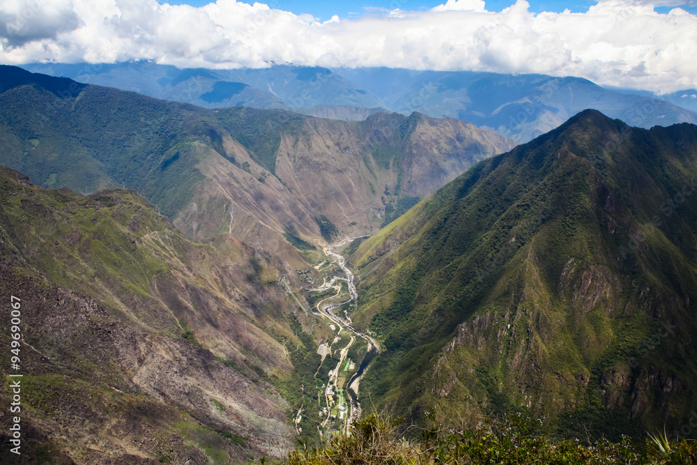 Naklejka premium River running along a valley as seen from Machu Picchu mountain in Peru