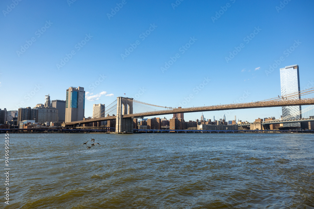 Brooklyn Bridge Over the East River on a Clear Day Brooklyn Bridge Over the East River on a Clear Day