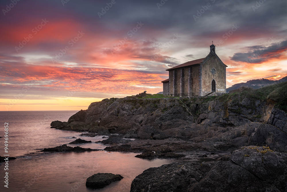 Blue hour at dawn at the Santa Katalina hermitage in Mundaka, Bizkaia Blue hour at dawn at the Santa Katalina hermitage in Mundaka, Bizkaia