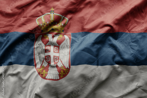 waving colorful realistic national flag of serbia . photo