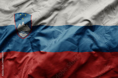 waving colorful realistic national flag of slovenia . photo