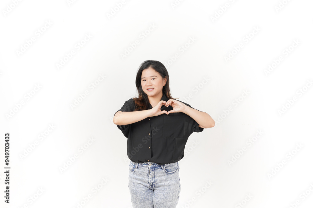 Young Asian woman showing love heart hand sign wearing Black t-shirt and jeans isolated on white background Young Asian woman showing love heart hand sign wearing Black t-shirt and jeans isolated on white background