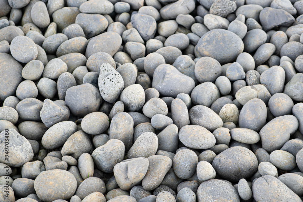 beautiful background of stones at the beach nearby the site Lóndrangar in Snaefellsnes, Western Iceland beautiful background of stones at the beach nearby the site Lóndrangar in Snaefellsnes, Western Iceland
