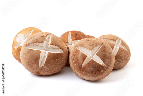 Fresh shiitake mushrooms on a white background