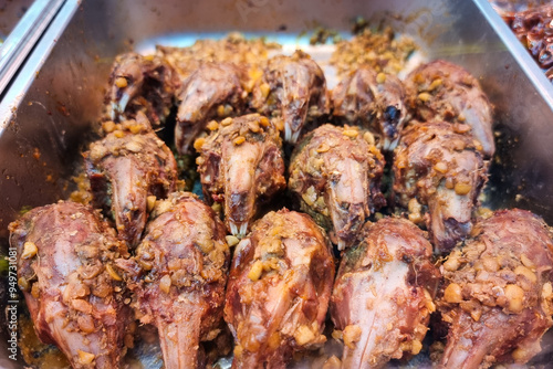 Wallpaper Mural Rabbit meat is delicacy in Sichuan province in China. Featured here rabbit head grilled with sauces, for sale in food stall. Torontodigital.ca