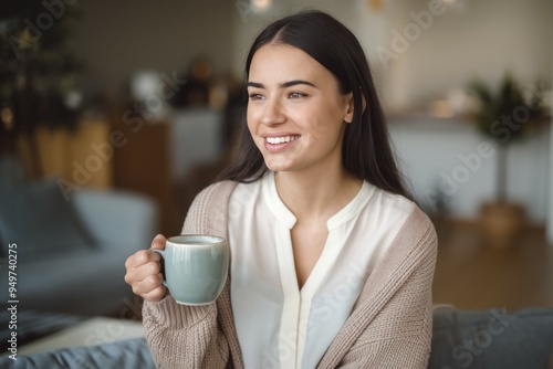 Happy woman coffee. Smiling woman enjoying her coffee, relaxing and looking away.