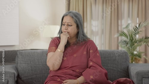 Stressed and tensed Indian old woman