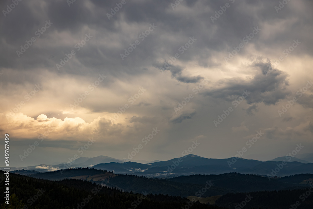Sunrise in the mountains, panoramic view, mountain peaks with clouds. Sunrise in the mountains, panoramic view, mountain peaks with clouds.