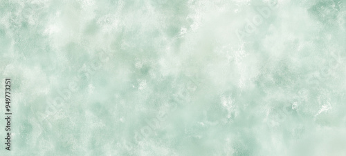 Abstract light green watercolor background with a soft vintage-style texture