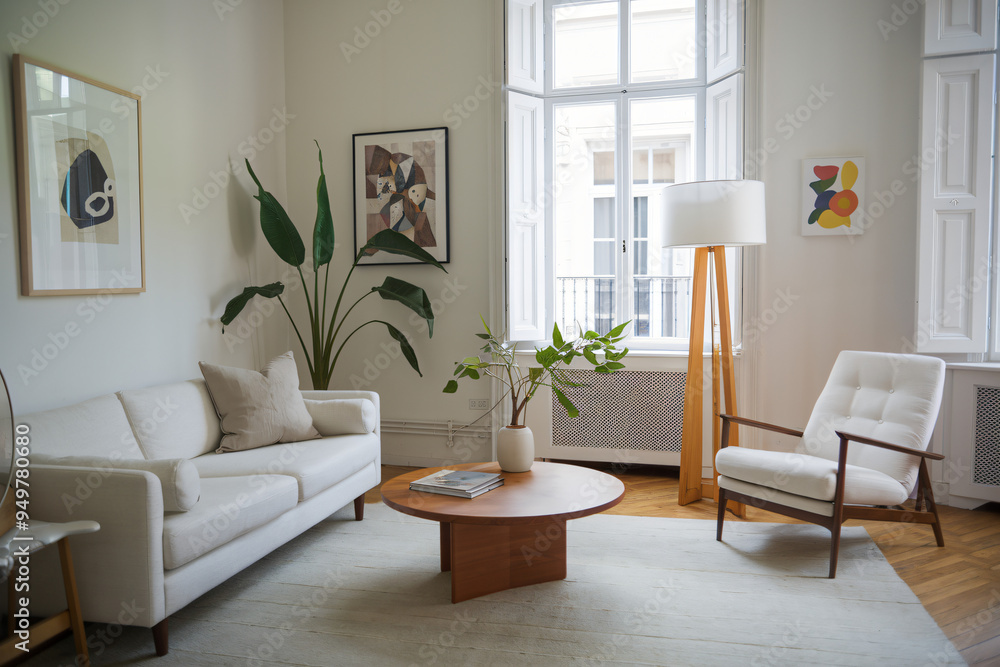 photo of a living room in a smart home showcases a white sofa with several pillows, a wooden coffee table in the center, and a wooden side table with a white lampshade. photo of a living room in a smart home showcases a white sofa with several pillows, a wooden coffee table in the center, and a wooden side table with a white lampshade.
