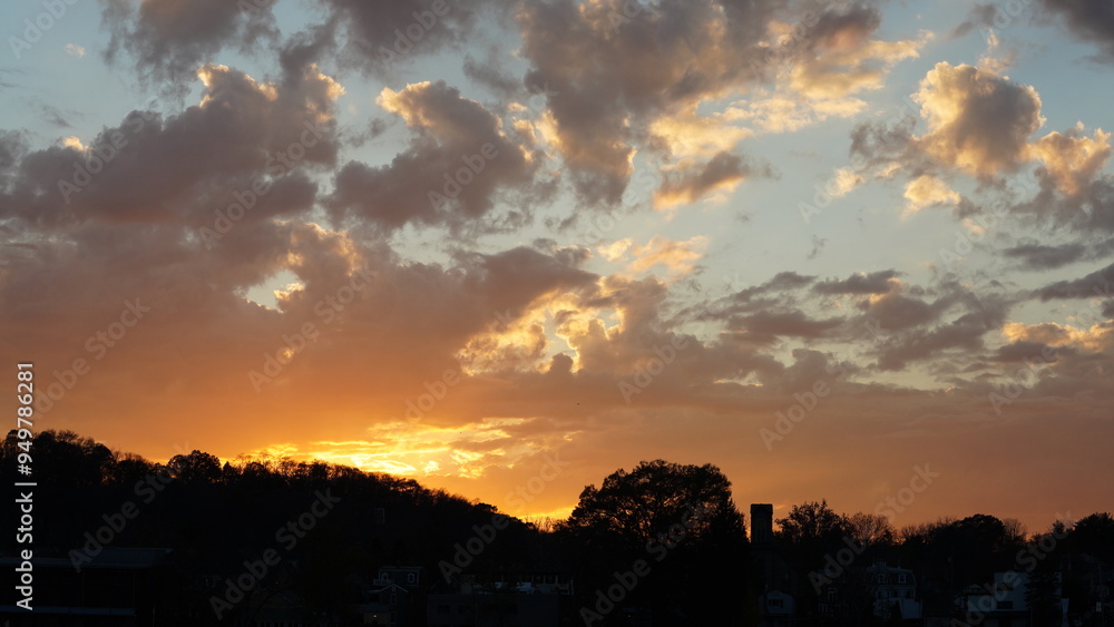 The beautiful sunset sky view with the colorful clouds as background The beautiful sunset sky view with the colorful clouds as background