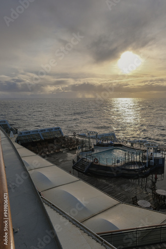 Breathtaking panoramic ocean views from outdoor deck of legendary ocean liner cruiseship cruise ship Queen Mary 2 during transatlantic crossing with sunset