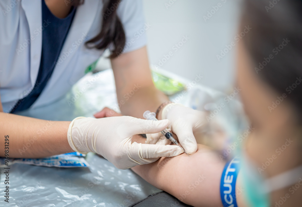 Close up hand of nurse, taking blood sample from a patient in the hospital. Close up hand of nurse, taking blood sample from a patient in the hospital.