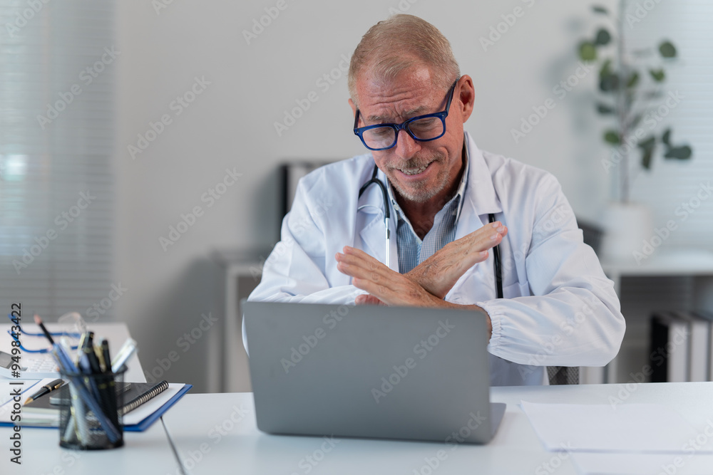 the doctor work with laptop at table in clinic. Online consultation the doctor work with laptop at table in clinic. Online consultation