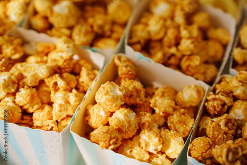 Caramel popcorn cups for a festive dessert. A simple and delicious candy bar for a party.