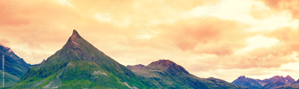 Fototapeta premium Mountain ridge during sunset. Lofoten islands. Norway. Horizontal banner