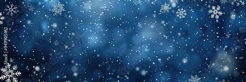 Snowy Christmas background with snowflakes falling against a dark blue sky