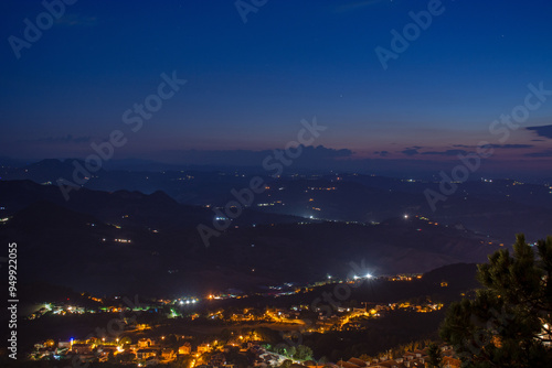 Obraz na płótnie San Marino - panorama cityscape by dusk w salonie