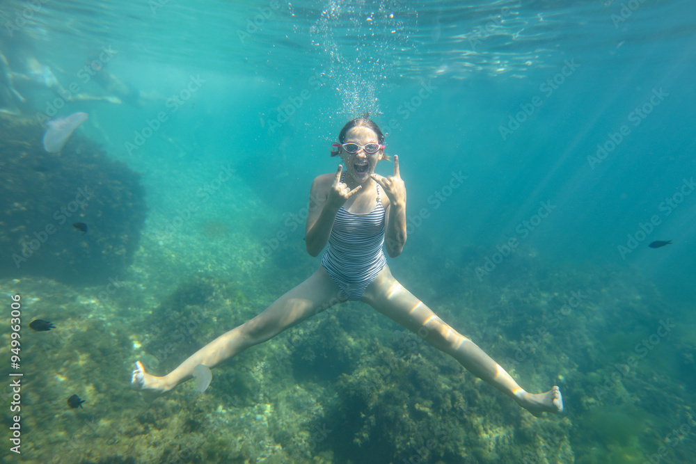 teen girl swimming in sea