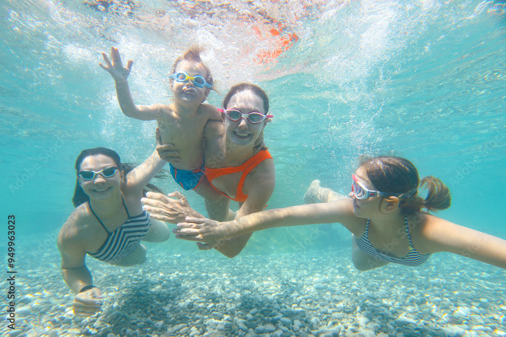 family in swimming pool