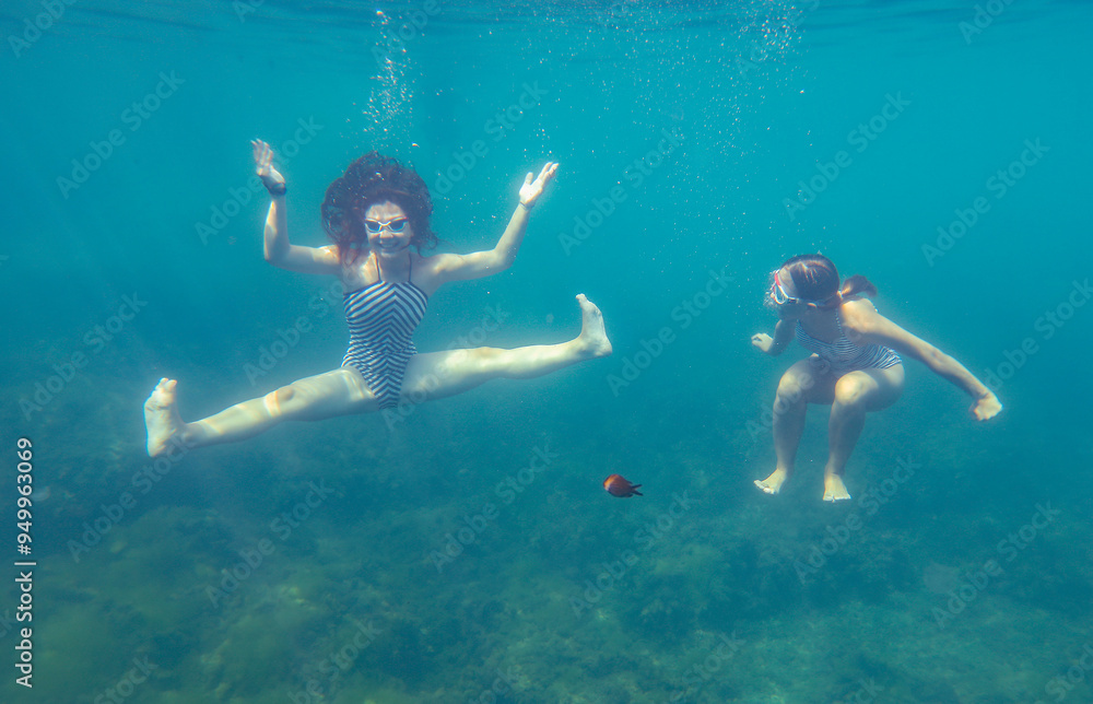 teen girl swimming in sea