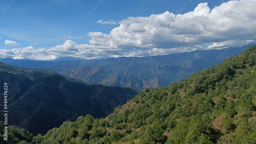 Fototapeta premium Buguias is a municipality located in the province of Benguet, Philippines. It is known for its cool climate, stunning mountainous landscapes, and as one of the country's leading vegetable-producing.