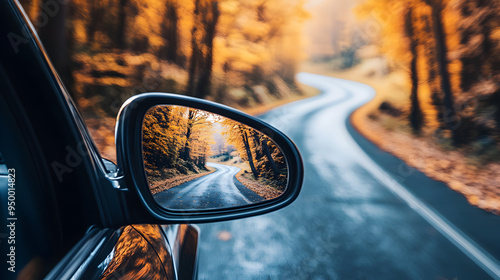Wallpaper Mural A close-up of a car’s side mirror reflecting a winding road behind, with the mirror and door frame dominating the image.


 Torontodigital.ca