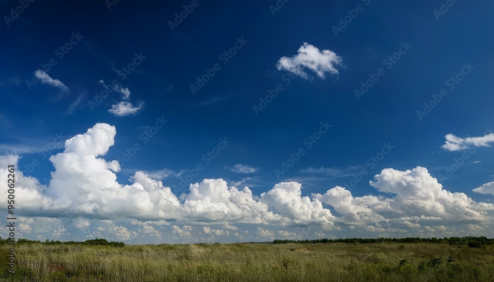 white fluffy clouds on blue sky in summer white fluffy clouds on blue sky in summer