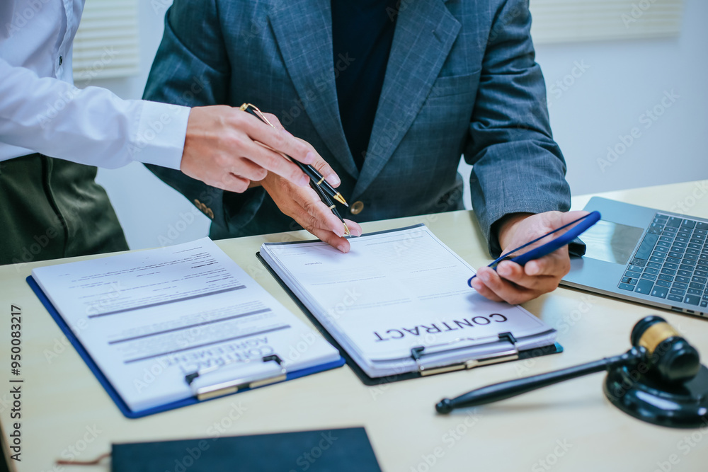 Two lawyers consult in a modern office, presenting compelling arguments and demonstrating their expertise, trying to win a case with their legal acumen and persuasive skills.
Two lawyers consult in a modern office, presenting compelling arguments and demonstrating their expertise, trying to win a case with their legal acumen and persuasive skills.