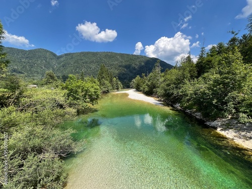 Sava Bohinjka river with surrounding forests during summer and low water level - Bohinjska Bistrica, Slovenia (Fluss Sava Bohinjka mit umliegenden Wäldern im Sommer - Slowenien) photo