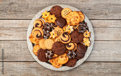 Mix of cookies . Many unhealthy snacks . Top view photo