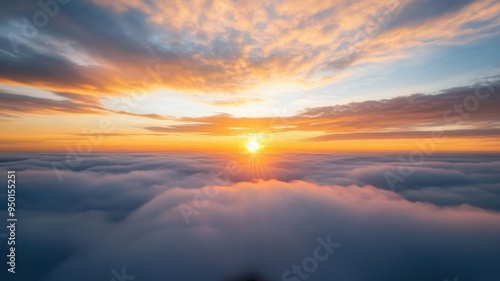 A breathtaking view of the sunset above the clouds, showcasing vibrant colors and peaceful serenity.