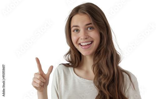 Excited young woman showing banner, pointing fingers left and smiling at camera, standing amazed on transparent