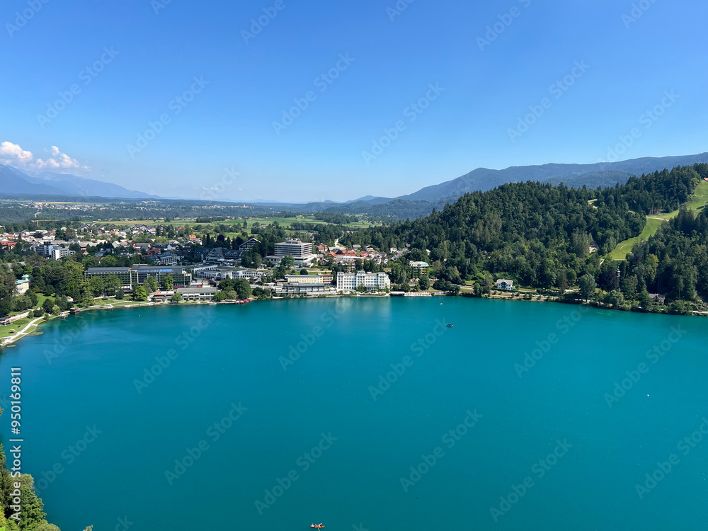 Panoramic view of Bled settlement and on Lake Bled (Blejsko jezero, Bleder See oder Veldeser See) from the castle of Bled (Blejski grad) - Bled, Slovenia Panoramic view of Bled settlement and on Lake Bled (Blejsko jezero, Bleder See oder Veldeser See) from the castle of Bled (Blejski grad) - Bled, Slovenia