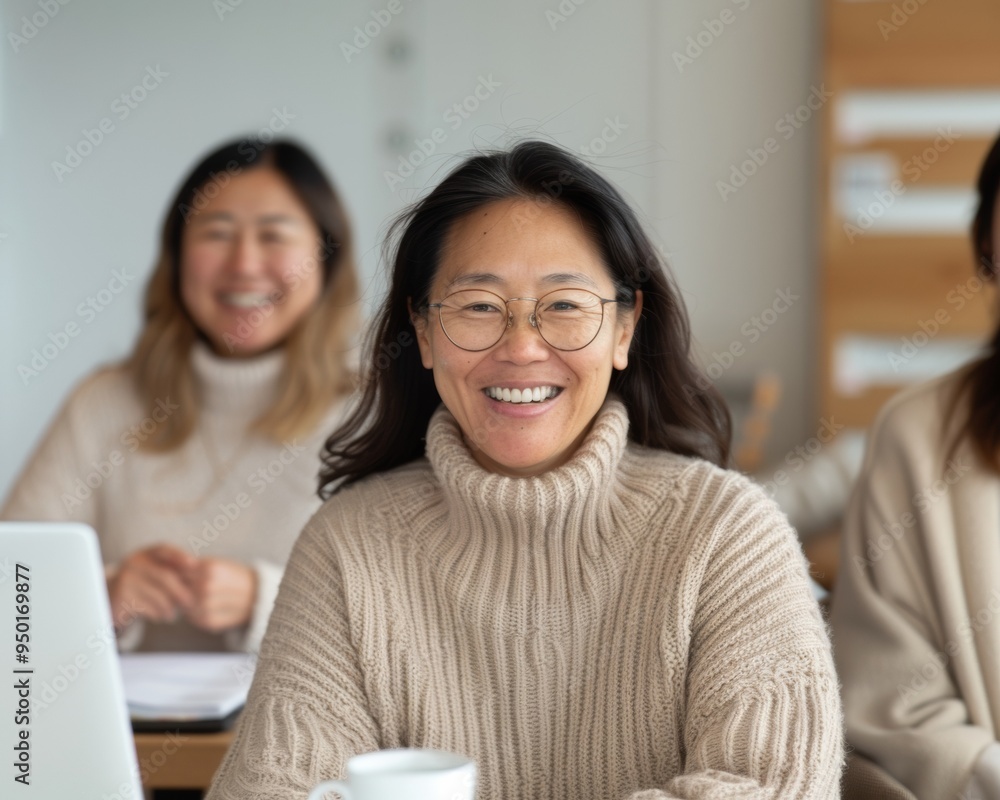 Asian Female Teachers in Their 30s Collaborating on Lesson Plans Over Coffee in a Bright Classroom, Morning, Cheerful Atmosphere, Cozy Sweaters Asian Female Teachers in Their 30s Collaborating on Lesson Plans Over Coffee in a Bright Classroom, Morning, Cheerful Atmosphere, Cozy Sweaters