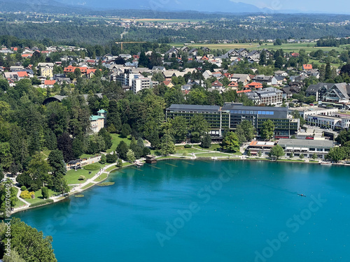 Panoramic view of Bled settlement and on Lake Bled (Blejsko jezero, Bleder See oder Veldeser See) from the castle of Bled (Blejski grad) - Bled, Slovenia photo