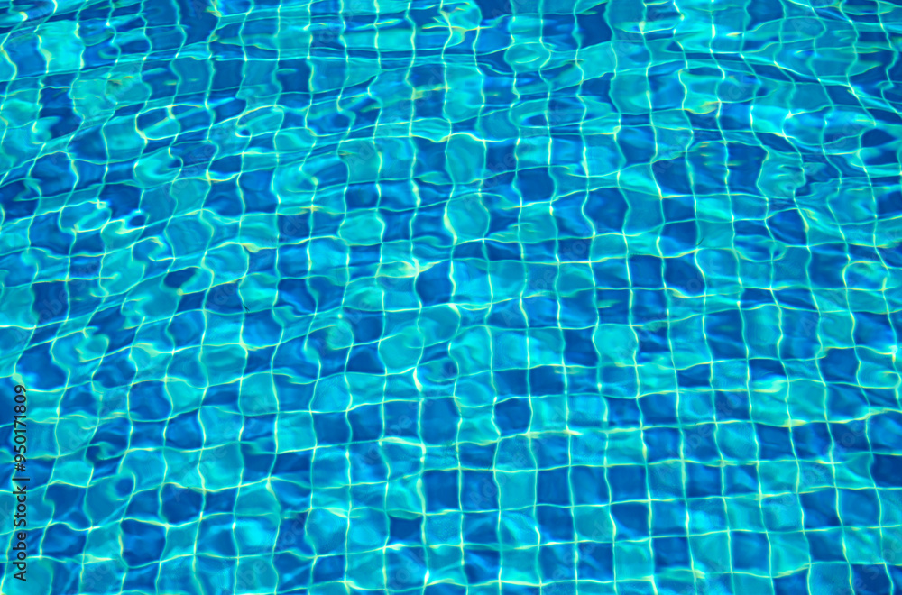Beautiful sun reflections of water in the pool. Summer. Flight holidays.. Background Beautiful sun reflections of water in the pool. Summer. Flight holidays.. Background