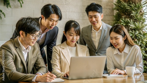 group of young asian business people brainstorming